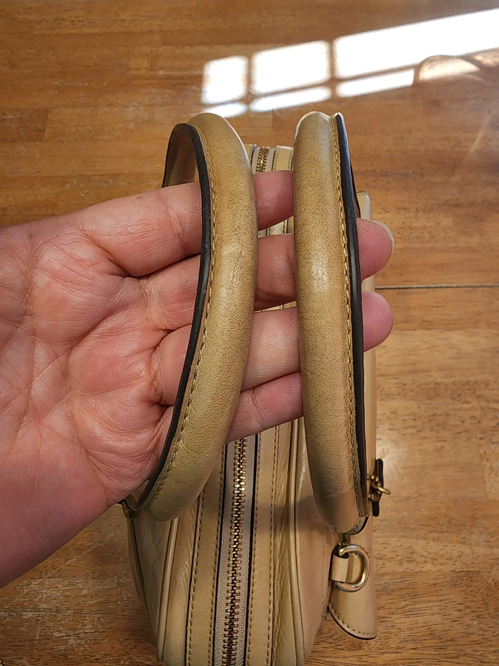 2011 Coach Poppy Push Lock Satchel features a beige leather exterior